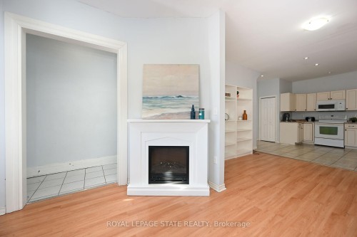 200 Kensington Avenue N, Hamilton, ON - Indoor Photo Showing Other Room With Fireplace
