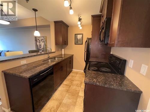 207 1220 Blackfoot Drive, Regina, SK - Indoor Photo Showing Kitchen With Double Sink