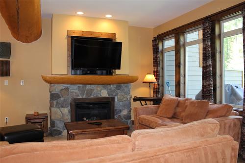O3-C-1351 Gerry Sorensen Way, Kimberley, BC - Indoor Photo Showing Living Room With Fireplace