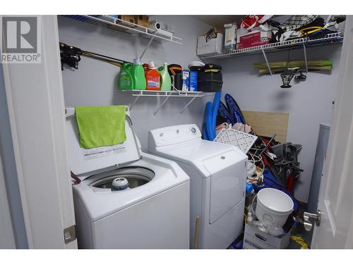 Laundry & mechanical room with storage - 8700 Clerke Road Unit# 3, Coldstream, BC - Indoor Photo Showing Laundry Room