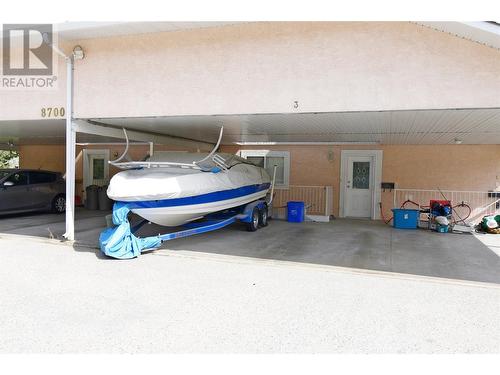 2 covered parking spots - 8700 Clerke Road Unit# 3, Coldstream, BC - Indoor Photo Showing Garage