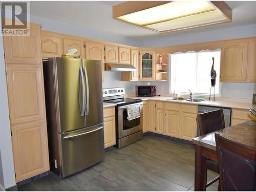 Kitchen - 8700 Clerke Road Unit# 3, Coldstream, BC - Indoor Photo Showing Kitchen With Double Sink