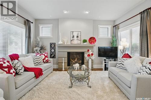 1603A 9Th Avenue N, Saskatoon, SK - Indoor Photo Showing Living Room With Fireplace