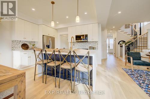 Photos of same floorpan previously built - 109 Thackeray Way, Minto, ON - Indoor Photo Showing Other Room