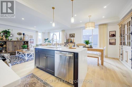 Photos of same floorpan previously built - 109 Thackeray Way, Minto, ON - Indoor Photo Showing Kitchen With Upgraded Kitchen