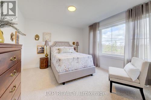 Photos of same floorpan previously built - 109 Thackeray Way, Minto, ON - Indoor Photo Showing Bedroom