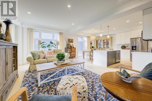 Photos of same floorpan previously built - 109 Thackeray Way, Minto, ON - Indoor Photo Showing Other Room