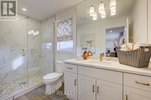 Photos of same floorpan previously built - 109 Thackeray Way, Minto, ON - Indoor Photo Showing Bathroom