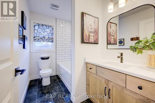 Photos of same floorpan previously built - 109 Thackeray Way, Minto, ON - Indoor Photo Showing Bathroom