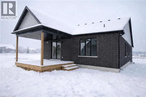 Hastings model - optional deck upgrade - 113 Thackeray Way, Harriston, ON - Outdoor With Exterior