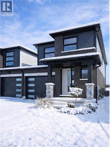 102 Thackeray Way, Harriston, ON - Outdoor With Facade