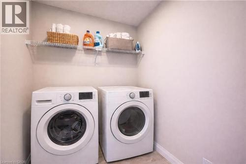 Virtaully staged - 102 Thackeray Way, Harriston, ON - Indoor Photo Showing Laundry Room