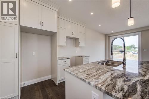 102 Thackeray Way, Harriston, ON - Indoor Photo Showing Kitchen With Double Sink