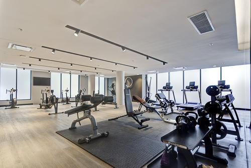 Coin-repas - 406-605 Rue De L'Escale, Brossard, QC - Indoor Photo Showing Gym Room