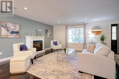 197 Trafalgar Street N, West Perth (Mitchell), ON - Indoor Photo Showing Living Room With Fireplace