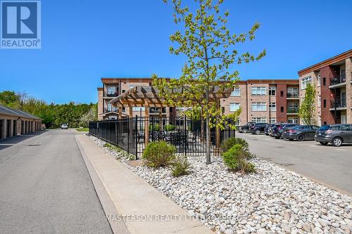 Inground Pool - 203 - 4644 Pettit Avenue, Niagara Falls (Morrison), ON - Outdoor With Balcony