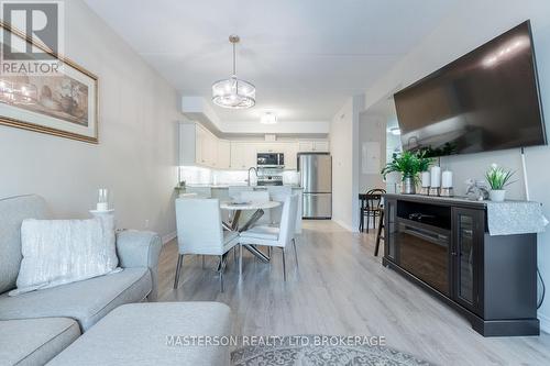 Dining Room - 203 - 4644 Pettit Avenue, Niagara Falls (Morrison), ON - Indoor Photo Showing Living Room