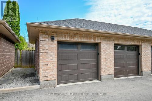 Garage - 203 - 4644 Pettit Avenue, Niagara Falls (Morrison), ON - Outdoor With Exterior