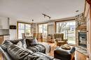 Living room - 219 Ch. Des Habitations-Des-Monts, Saint-Sauveur, QC  - Indoor Photo Showing Living Room With Fireplace 