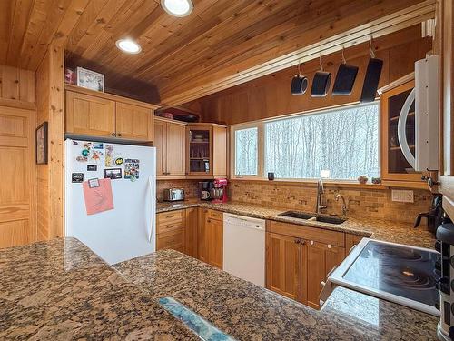 67 Hilltop Crescent, Onanole, MB - Indoor Photo Showing Kitchen With Double Sink
