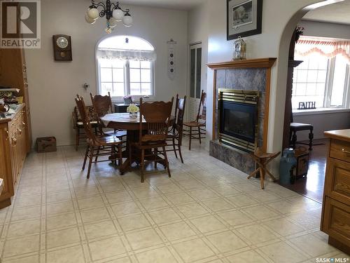 28 Highway Avenue W, Preeceville, SK - Indoor Photo Showing Dining Room With Fireplace