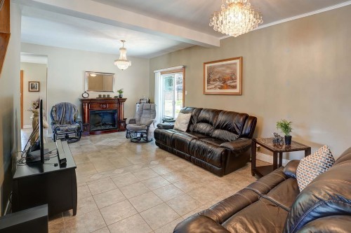 Salon - 8829 Route 117 S., Rivière-Rouge, QC - Indoor Photo Showing Living Room With Fireplace