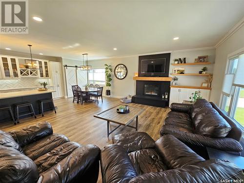 5 Souris Avenue, Redvers, SK - Indoor Photo Showing Living Room With Fireplace