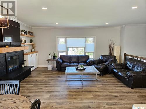 5 Souris Avenue, Redvers, SK - Indoor Photo Showing Living Room With Fireplace