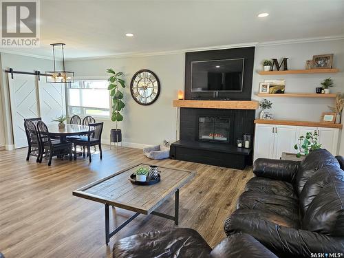 5 Souris Avenue, Redvers, SK - Indoor Photo Showing Living Room With Fireplace