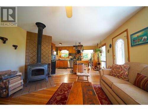 425 Alexander Road, Procter, BC - Indoor Photo Showing Living Room With Fireplace