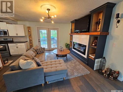 306 West 1St Street, Alida, SK - Indoor Photo Showing Living Room With Fireplace