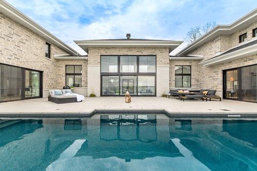 Face arrière - 21 Prom. St-Louis, Notre-Dame-De-L'Île-Perrot, QC - Outdoor With In Ground Pool