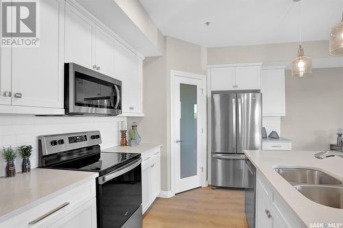 301 4594 Harbour Landing Drive, Regina, SK - Indoor Photo Showing Kitchen With Double Sink With Upgraded Kitchen