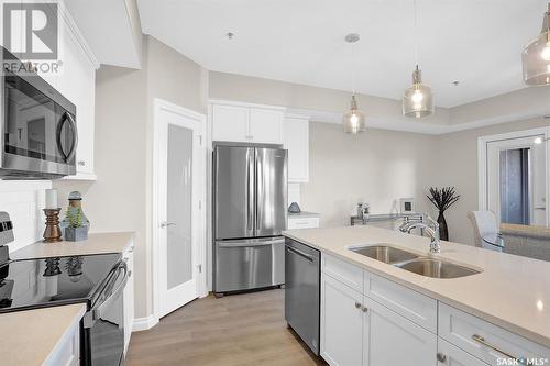 402 4594 Harbour Landing Drive, Regina, SK - Indoor Photo Showing Kitchen With Double Sink With Upgraded Kitchen