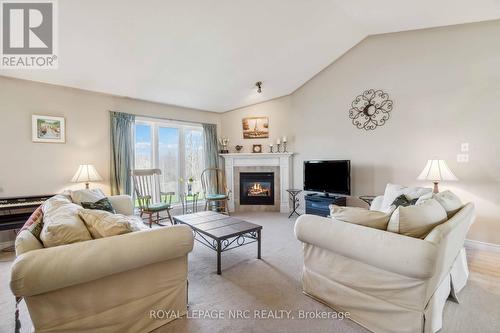 449 Barrington Court, Fort Erie (Ridgeway), ON - Indoor Photo Showing Living Room With Fireplace