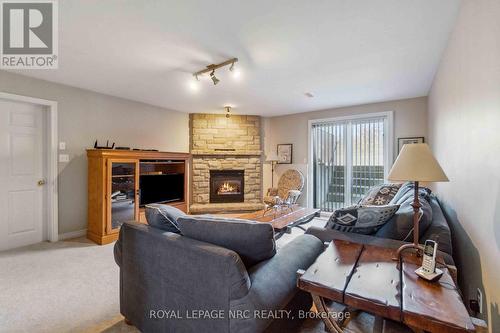 449 Barrington Court, Fort Erie (Ridgeway), ON - Indoor Photo Showing Living Room With Fireplace