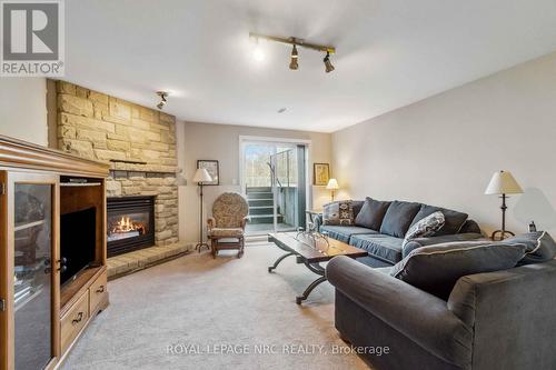 449 Barrington Court, Fort Erie (Ridgeway), ON - Indoor Photo Showing Living Room With Fireplace