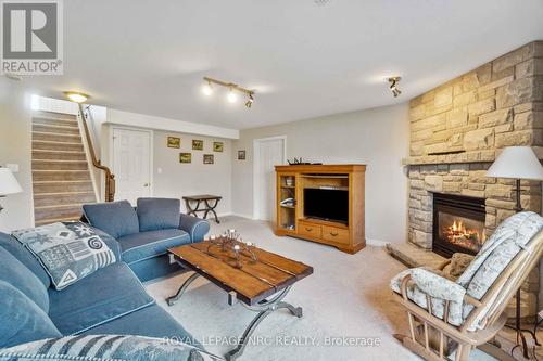 449 Barrington Court, Fort Erie (Ridgeway), ON - Indoor Photo Showing Living Room With Fireplace