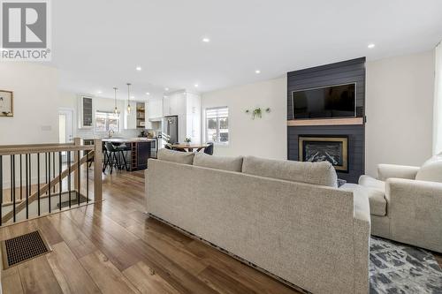 12 Ursula Crescent, St. Philips, NL - Indoor Photo Showing Living Room With Fireplace
