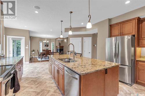Estates Drive, Elk Ridge, SK - Indoor Photo Showing Kitchen With Stainless Steel Kitchen With Double Sink With Upgraded Kitchen
