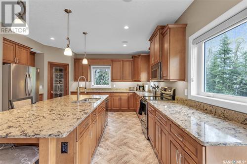 Estates Drive, Elk Ridge, SK - Indoor Photo Showing Kitchen With Stainless Steel Kitchen With Double Sink With Upgraded Kitchen