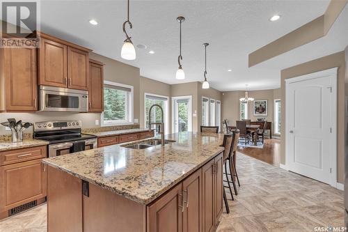Estates Drive, Elk Ridge, SK - Indoor Photo Showing Kitchen With Double Sink With Upgraded Kitchen