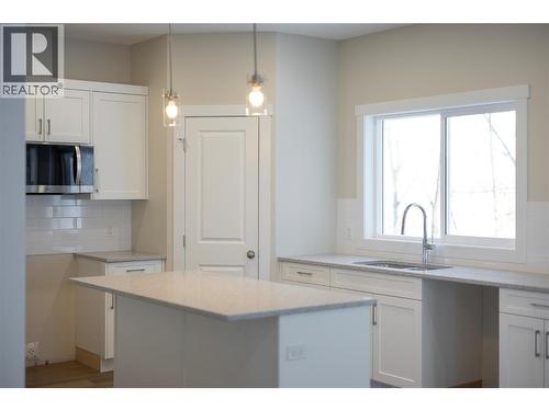 Similar to - 806 Cliff Avenue Unit# 102, Enderby, BC - Indoor Photo Showing Kitchen