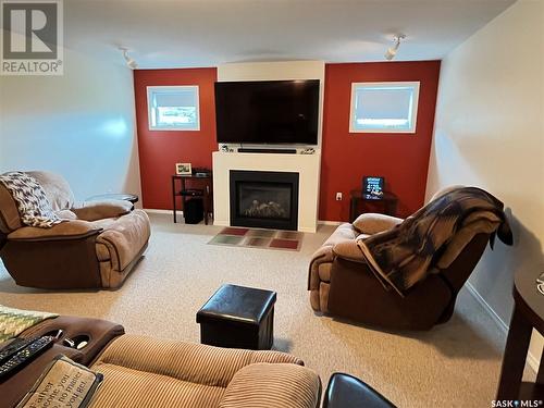 12 Chinook Place, Maple Creek, SK - Indoor Photo Showing Living Room With Fireplace