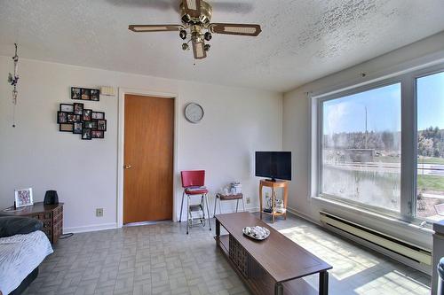 Salon - 371  - 377 Av. Champlain, Malartic, QC - Indoor Photo Showing Living Room