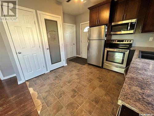 205 Carl Avenue E, Langenburg, SK - Indoor Photo Showing Kitchen With Double Sink