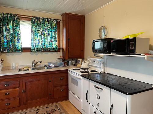 314 Main Street, Swan River, MB - Indoor Photo Showing Kitchen With Double Sink