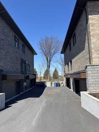 Garage - 3-38 Rue De Sofia, Candiac, QC - Outdoor With Exterior