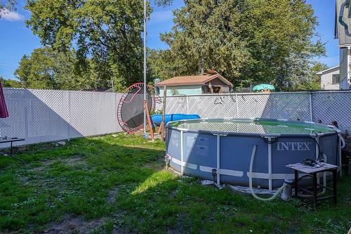 Cour - 1134  - 1138 Rue Renaud, Mascouche, QC - Outdoor With Above Ground Pool