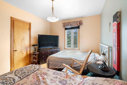 Chambre à coucher principale - 7696 Boul. Ste-Anne, Château-Richer, QC - Indoor Photo Showing Bedroom